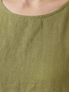 Lightweight cotton linen sleeveless maxi dress with round neckline and flowing ankle-length silhouette