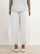 100% linen harem balloon pants with elastic drawstring waistband and side pockets in natural linen texture
