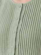 Sleeveless cotton linen pleated midi dress with pintuck bodice and full A-line skirt in white