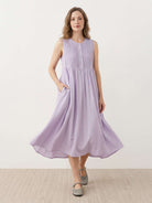 Sleeveless cotton linen pleated midi dress with pintuck chest detail and full A-line skirt in relaxed fit