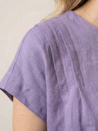 100% linen boxy cap-sleeve top with round scoop neck and hip-length hem