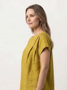 100% linen boxy cap-sleeve top with scoop neck and hip-length hem