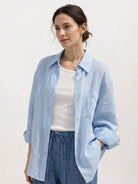 100% linen dropped-shoulder loose fit shirt with side slits and rollable cuffs