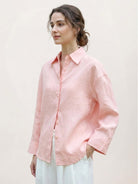 Loose oversized 100% linen dropped-shoulder shirt with button front and rollable long sleeves