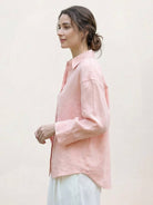 100% linen dropped-shoulder oversized shirt with button front and rollable cuffs