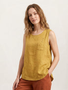 Lightweight cotton linen sleeveless top with curved hem and chest pocket detail