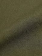 Wrinkle-free maxi-length button-down dress with point collar, chest pockets, and side slits for easy movement