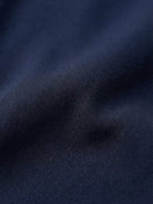 Long wrinkle-free button-down maxi dress with point collar, chest pockets, side slits, and roll-up sleeves