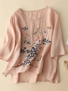 100% cotton linen hand-embroidered shirt with 3/4 flared sleeves and asymmetric hem