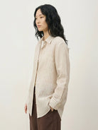 100% linen loose-fit pinstripe shirt with drop shoulders and button cuffs