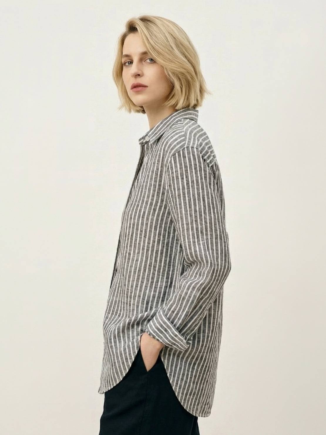 100% linen pinstripe shirt with loose fit, drop shoulders, and button cuffs