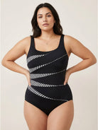 Woman wearing a Curve-Fit Open-Back Swimsuit with scoop front and deep V open back featuring diagonal panels and adjustable straps