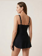 Ruched wrap one-piece swimdress with adjustable straps and tie-front skirt in matte fabric