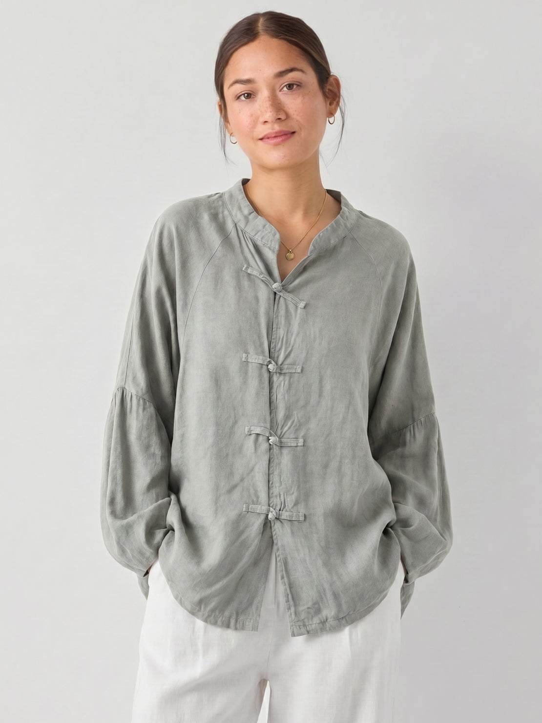 Oversized linen-cotton tang knot blouse with batwing sleeves and asymmetric hem