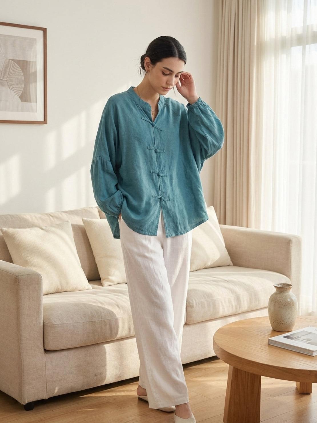 Oversized linen-cotton blouse with batwing sleeves and frog button closures