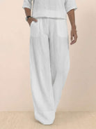 White short-sleeved pullover and wide trouser matching set in breathable cotton with deep pockets and relaxed fit