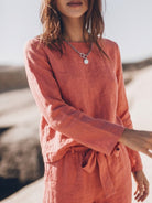 Woman wearing cotton-linen monochrome longline top and wide-leg pants set