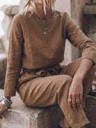 Woman wearing cotton-linen monochrome relaxed longline top and wide-leg pants set