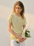 100% linen rolled cuff tee with relaxed scoop neckline and contrast inner lining