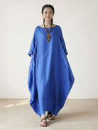 Oversized bohemian maxi dress in breathable cotton-polyester blend with long sleeves and loose fit