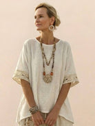 Coastal Comfort Linen two-piece set with crochet lace and breathable fabric on white background