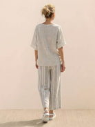 Coastal Comfort Linen two-piece set with lace details and breathable fabric for elegant, relaxed wear