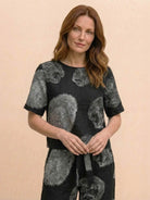 Woman wearing breathable cotton linen set with relaxed fit and monochrome design