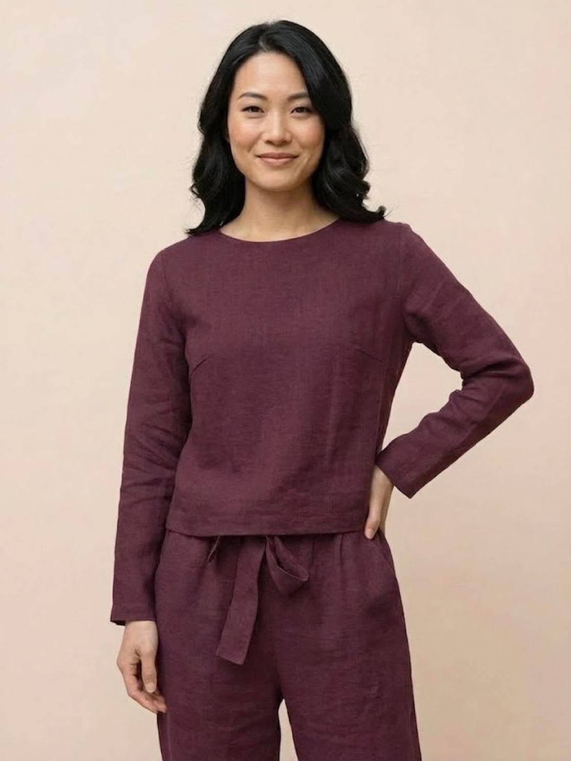 Cotton-linen monochrome relaxed longline top and wide-leg pants set on model against white background