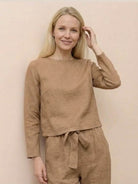 Cotton-linen monochrome relaxed longline top and wide-leg pants set with natural crumple, perfect for versatile, travel-ready style