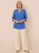 woman wearing pure linen age-defying button detail shirt in soft white