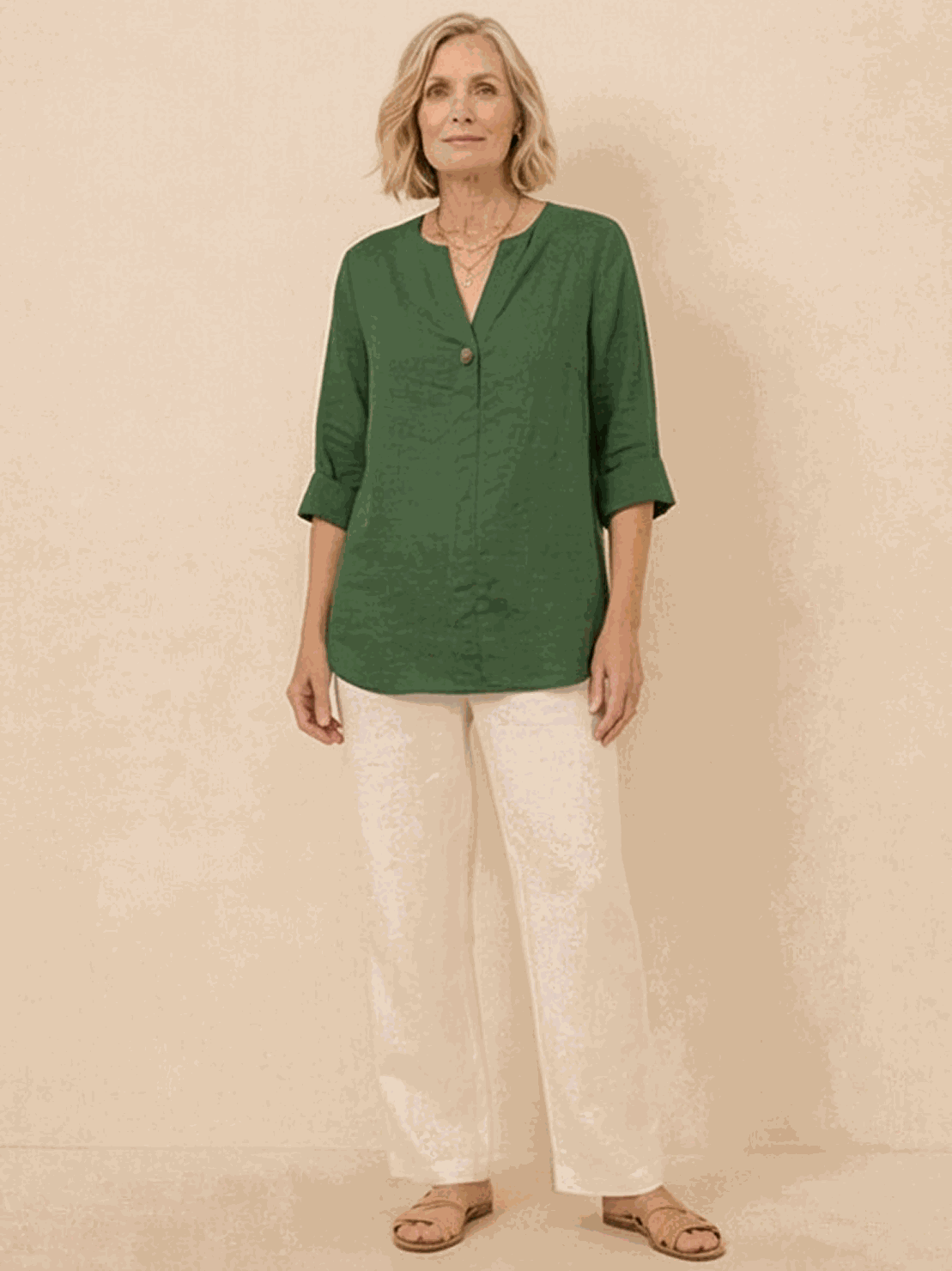 white pure linen age-defying shirt with button detail on wooden hanger