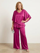 woman wearing elegant layers two-piece set with layered V-neck top and matching pants