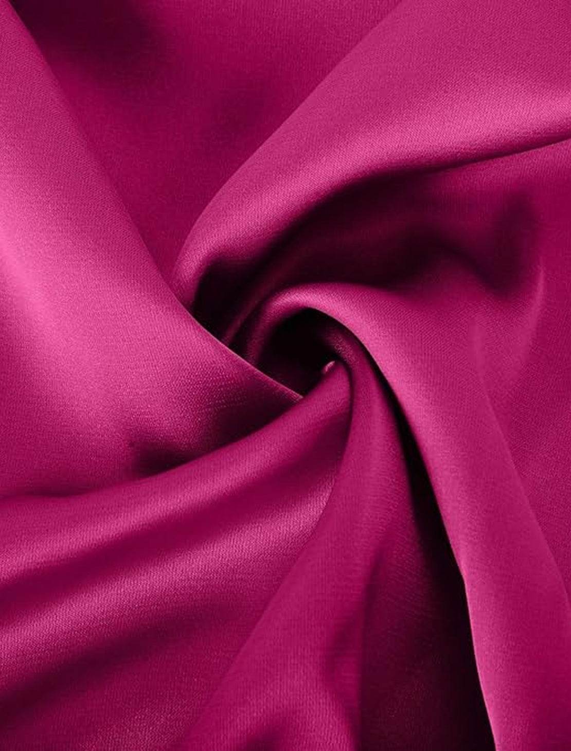 Woman wearing Elegant Layers Two-Piece Set with layered V-neck top and matching pants in soft fabric