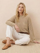 European Minimalism relaxed sweater top and white trousers set with knit pocket detail