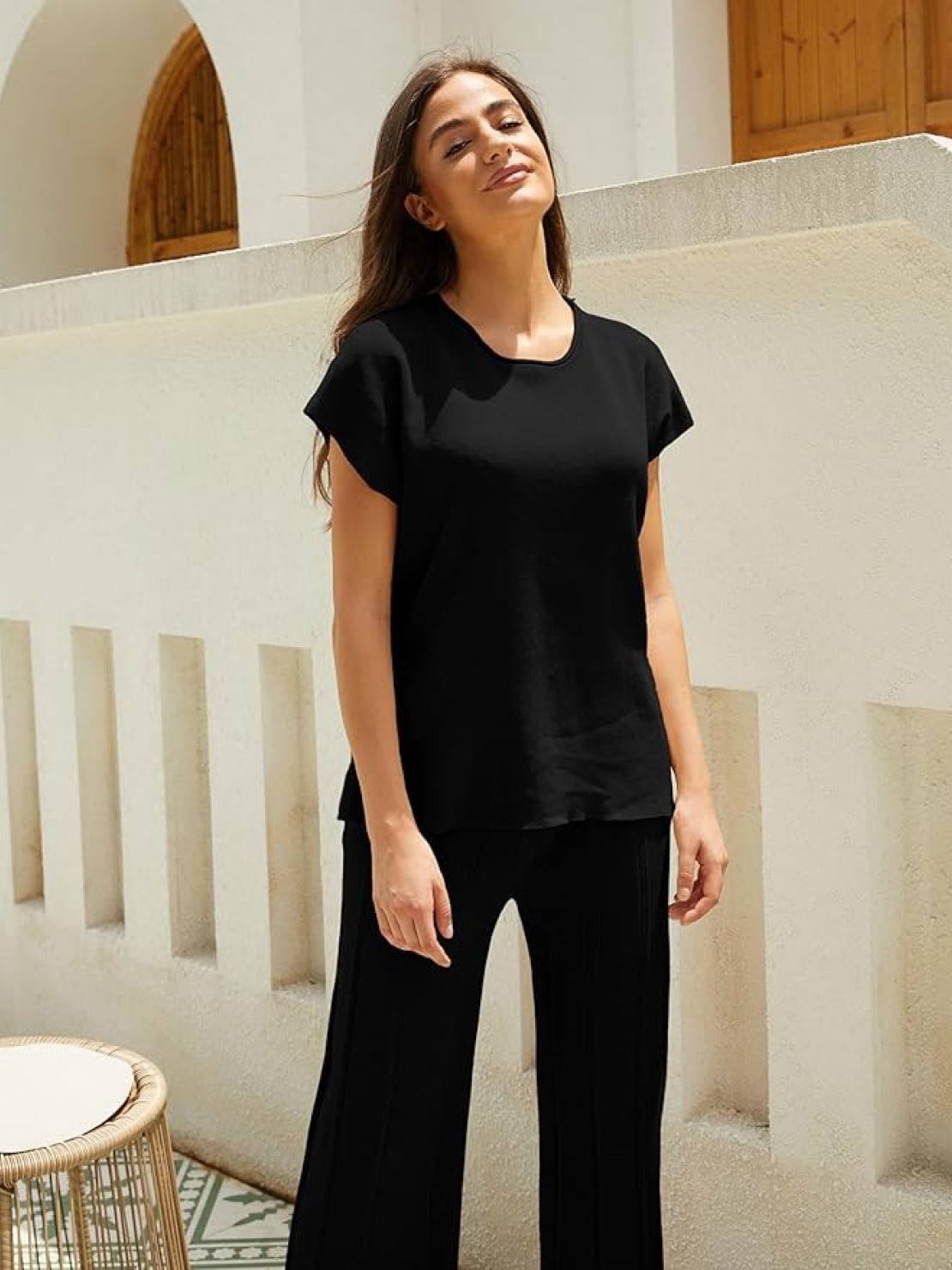 First Class Travel two-piece set in soft viscose-acrylic with pleated wide-leg pants and matching top for wrinkle-resistant comfort and versatile style