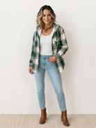 Highland Plaid Shacket with soft fleece lining, hood, button-front, and front pockets in classic plaid pattern.