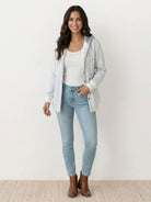 Highland Plaid Shacket with soft fleece lining, hood, button-front, and plaid pattern for cozy layering