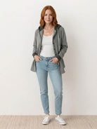 Highland Plaid Shacket with soft fleece lining, hood, button-front, and front pockets in classic plaid pattern