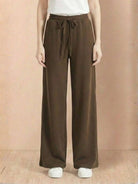 Wide-leg brown pants from Lyocell-Blend Hooded Set with elastic waist and drawstring, styled with white sneakers