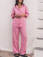 Model wearing an oversized 100% cotton shirt and wide-leg pants co-ord set in a relaxed, breathable style