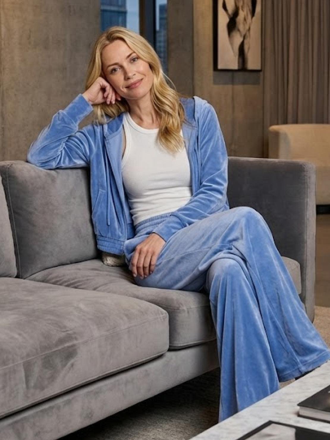 woman modeling cropped velour tracksuit with high-waist pants in soft plush fabric