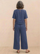 Woman wearing the Meadow loose fit co-ord set with soft-tailored top and wide-leg bottoms in relaxed style