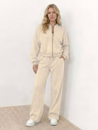 The Voyager Zip Set two-piece matching zip-front sweatshirt and wide-leg joggers for travel and comfort