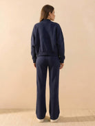 The Voyager Zip Set two-piece zip-front sweatshirt and wide-leg joggers in coordinating light grey travel loungewear