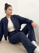 The Voyager Zip Set two-piece zip-front sweatshirt and wide-leg joggers travel outfit with pockets and lightweight comfort