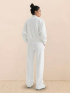 The Voyager Zip Set two-piece zip-front sweatshirt and wide-leg joggers in light grey for travel and casual wear