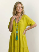 V-neck two-tiered maxi swing dress in lightweight cotton with flowy tiers and irregular hemline