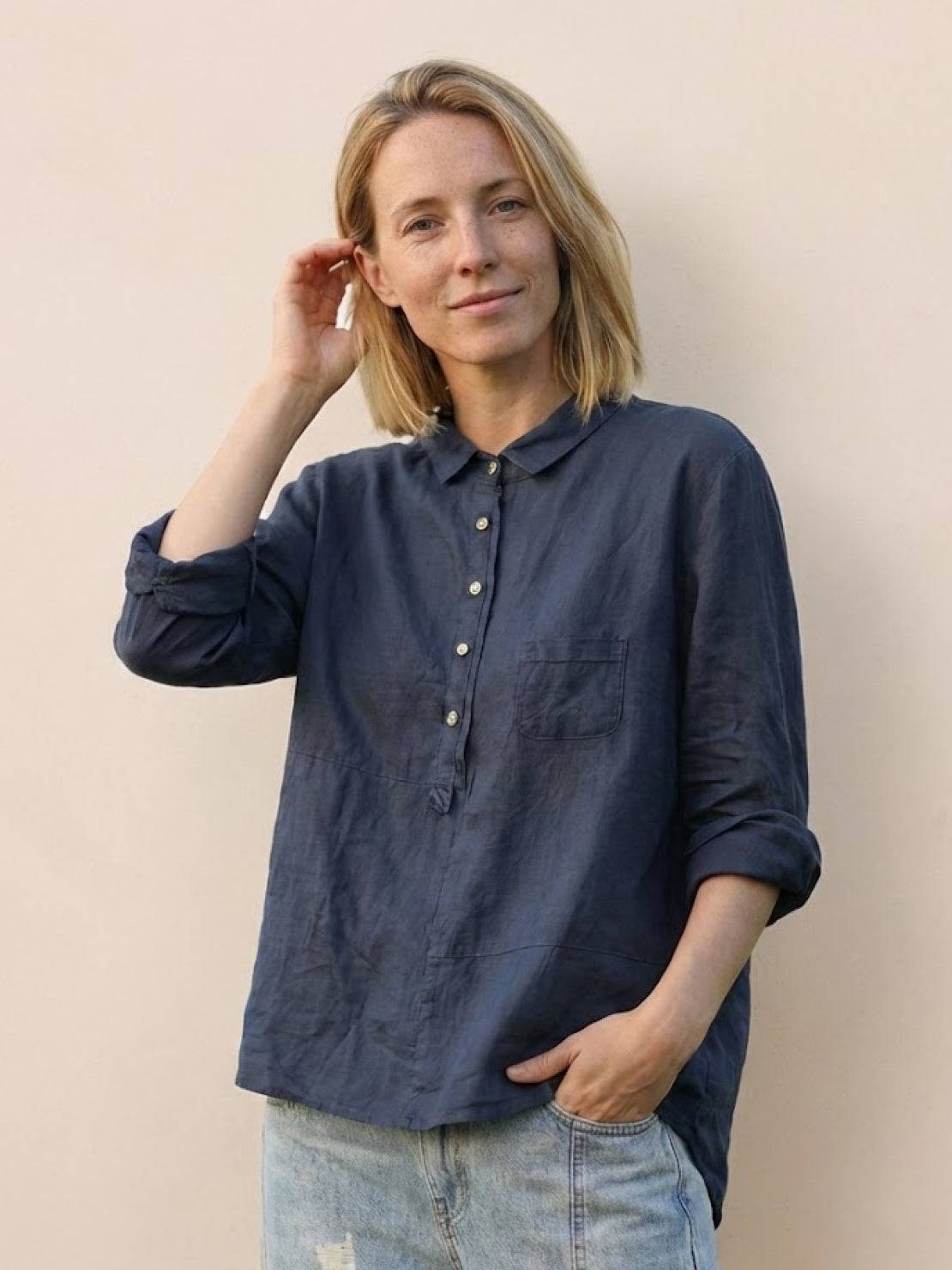 Vintage linen shirt made of breathable cotton-linen blend, perfect for casual chic style and travel.