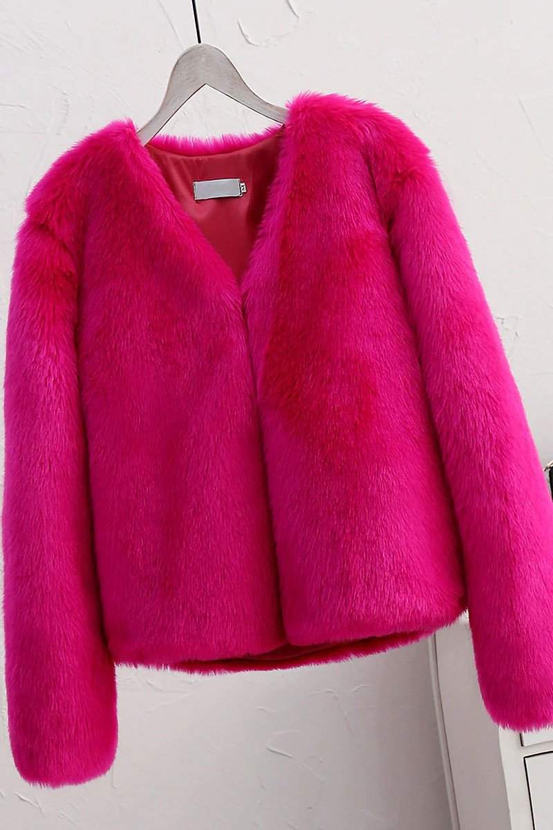 Bold faux fur luxe jacket with V neckline and button closure in vibrant pink
